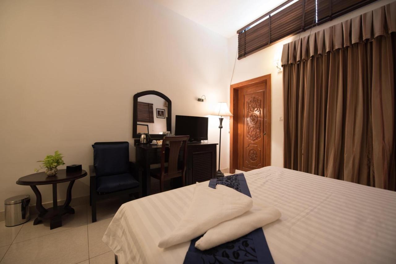 Homesyn Hotel Phnom Penh Bagian luar foto
