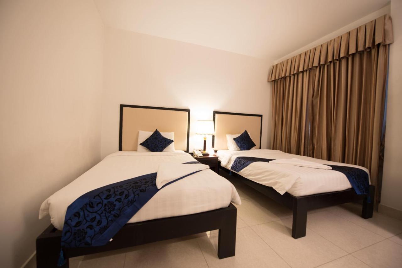 Homesyn Hotel Phnom Penh Bagian luar foto