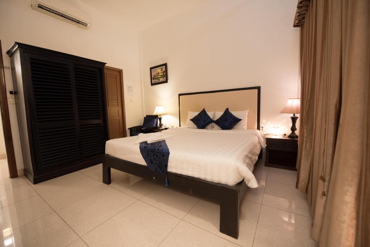 Homesyn Hotel Phnom Penh Bagian luar foto