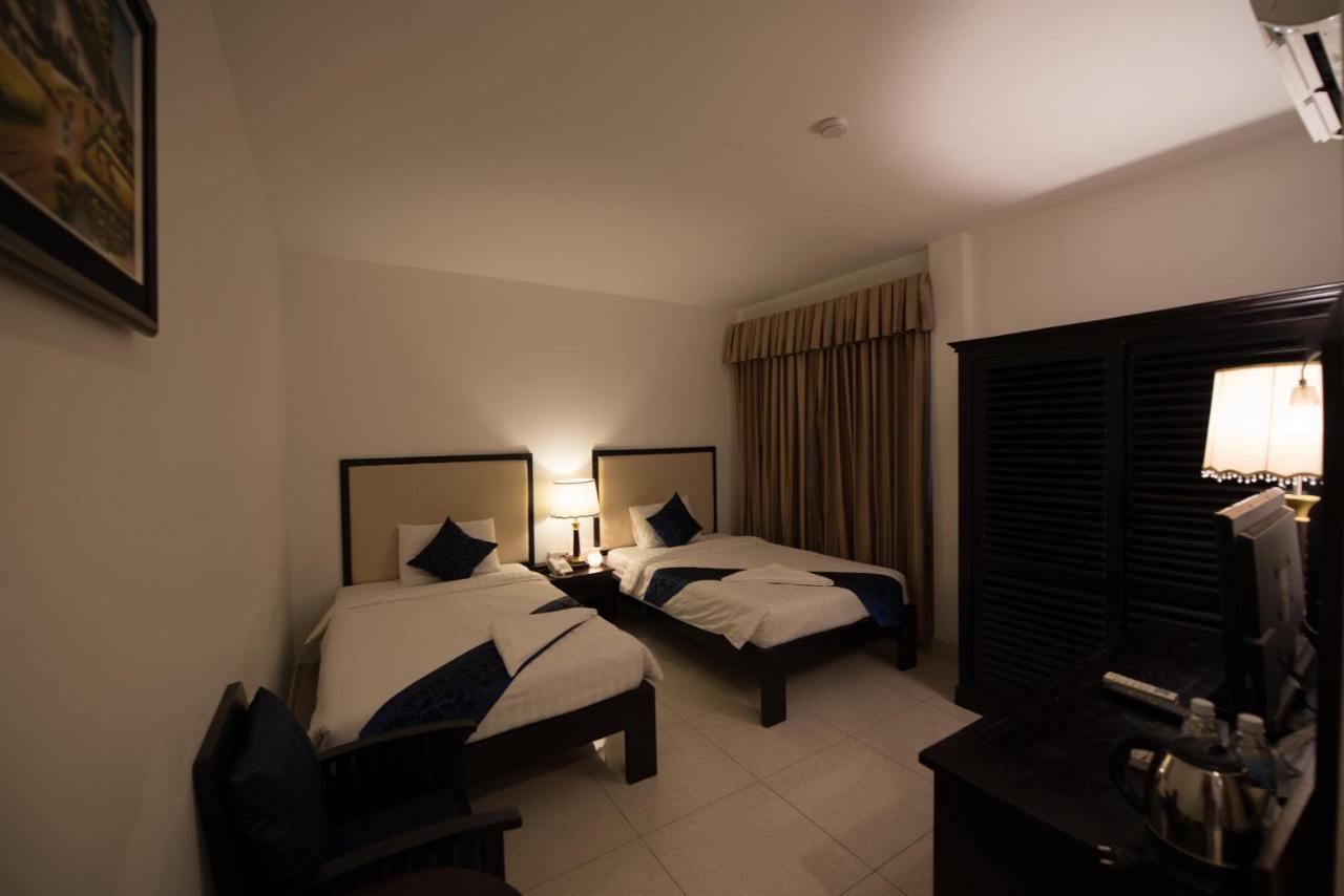 Homesyn Hotel Phnom Penh Bagian luar foto