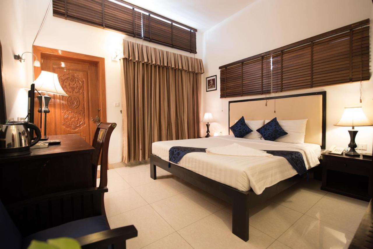 Homesyn Hotel Phnom Penh Bagian luar foto