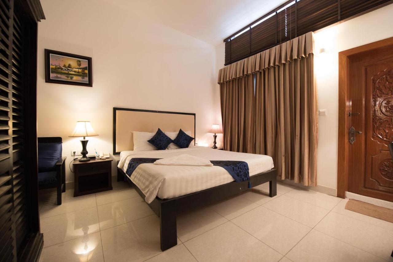 Homesyn Hotel Phnom Penh Bagian luar foto