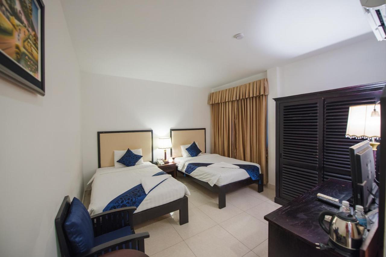 Homesyn Hotel Phnom Penh Bagian luar foto