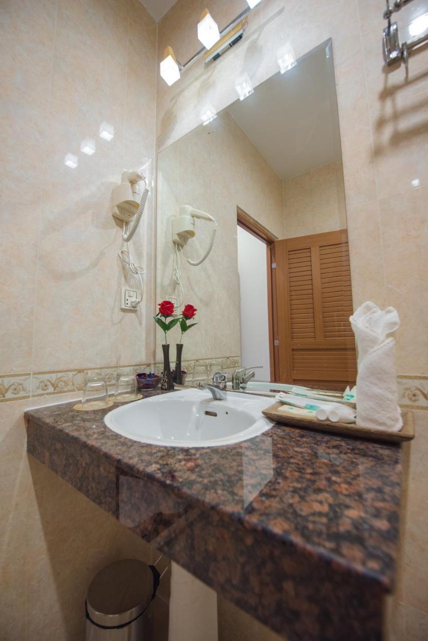 Homesyn Hotel Phnom Penh Bagian luar foto